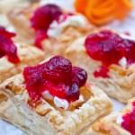cranberry, cointreau and clementine sauce on mini pastries
