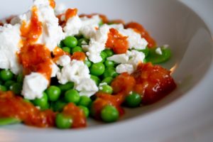 Peas, Broad Beans and Feta with Roasted Tomato and Chilli Sauce - close up