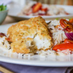 Lemon and Black Pepper Cod with Balsamic Roasted Vegetables and Rice, close up
