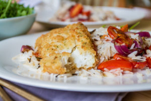 Lemon and Black Pepper Cod with Balsamic Roasted Vegetables and Rice, close up