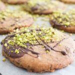 Decorating chocolate pistachio biscuits