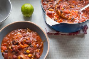 chipotle and bean soup served with lime