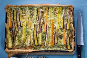 Rainbow carrot tart with summer herbs and goat's cheese