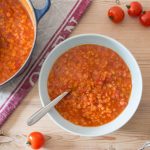 red lentil and tomato soup served in bowl