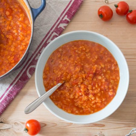 red lentil and tomato soup served in bowl