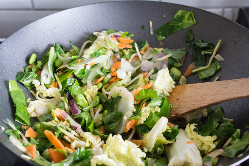 stir frying vegetables, including chard and kohlrabi