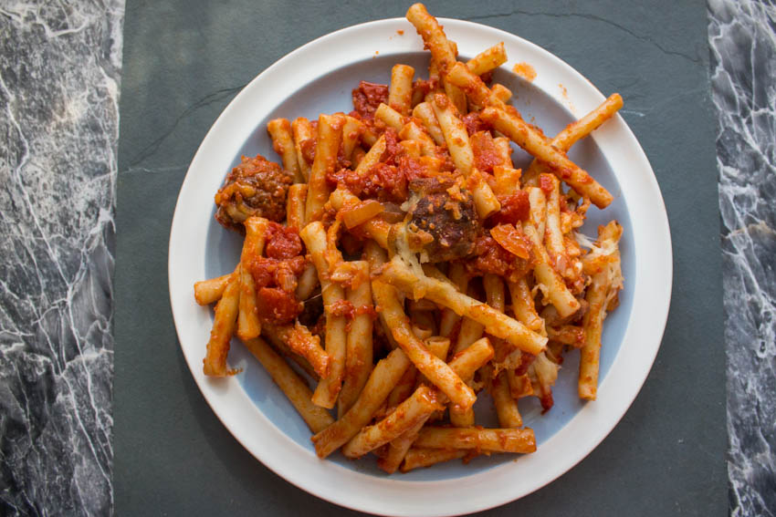 Meatballs, tomato sauce and mozzarella pasta bake