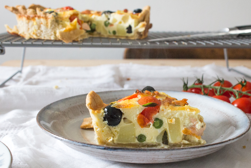Salmon and salad quiche baked and sliced